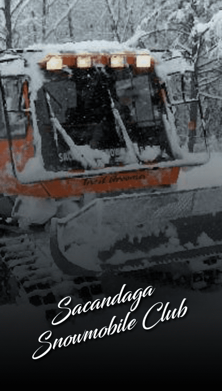 groomer working on trail in winter