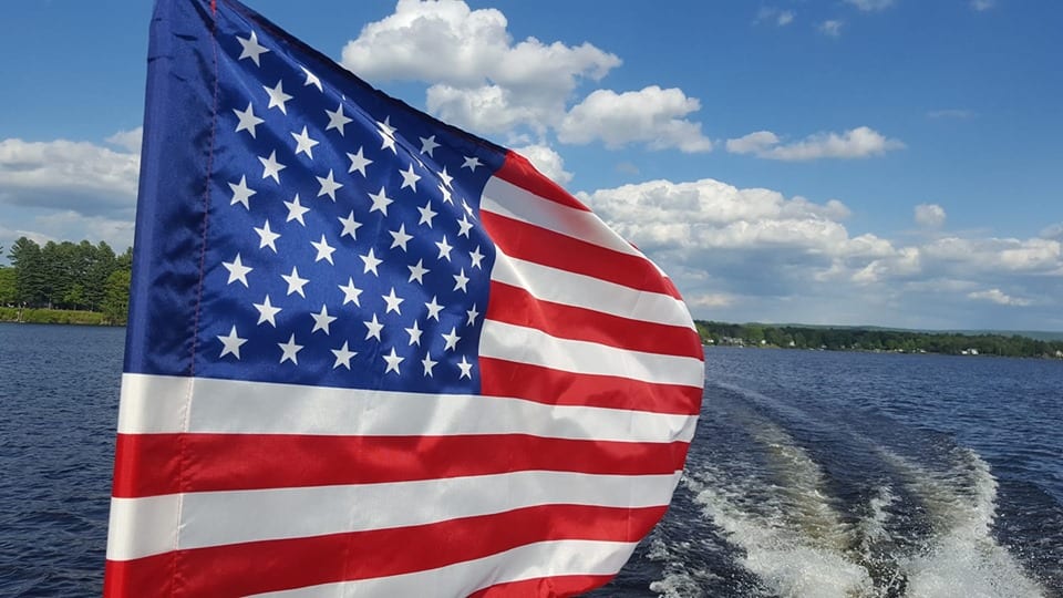 Flag on Running Boat